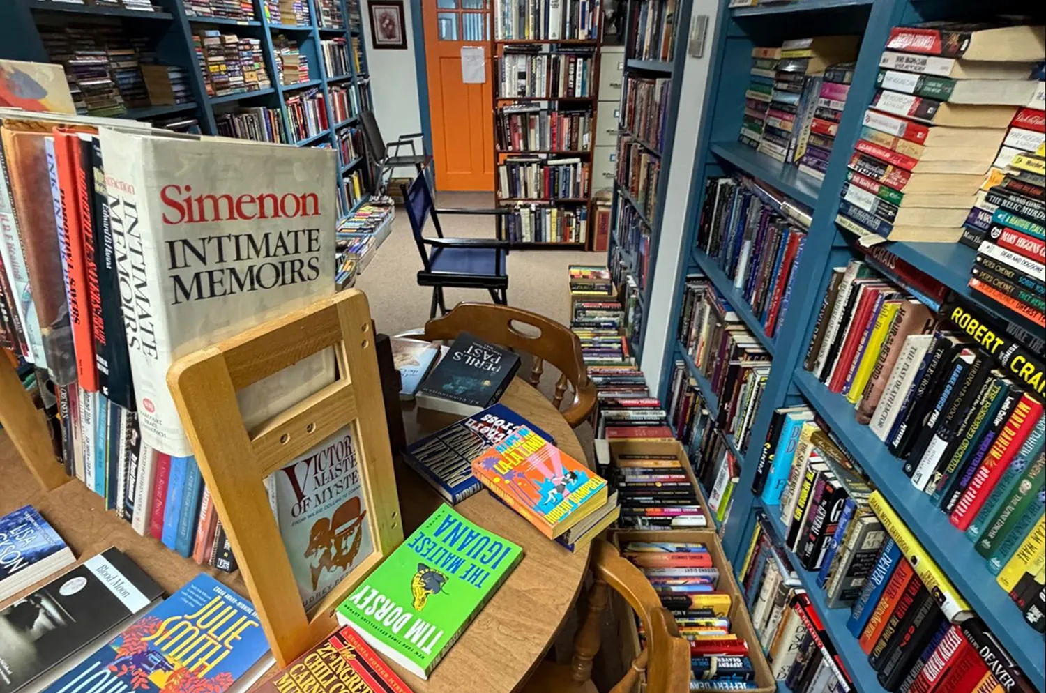 A table of local books inside Battenkill Books