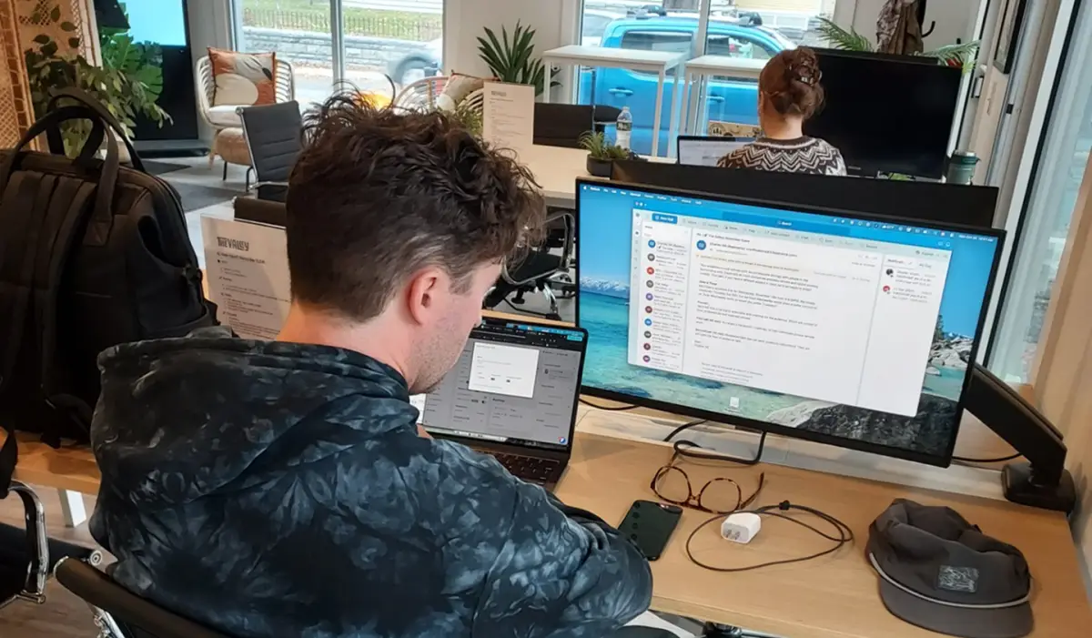 A member working at a desk inside The Valley Hub